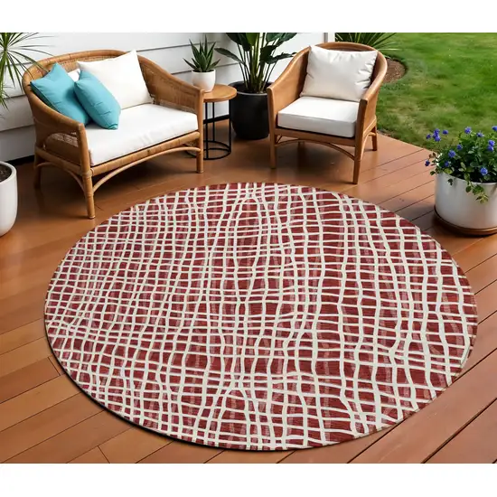 8' Burgundy And Ivory Round Striped Washable Indoor Outdoor Area Rug Photo 1