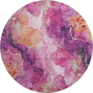 Photo of 8' Burgundy And Salmon Abstract Washable Round Rug With UV Protection