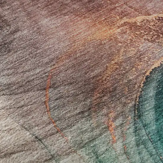 8' Burgundy Blue And Ivory Abstract Washable Round Rug With UV Protection Photo 9