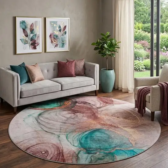 8' Burgundy Blue And Ivory Abstract Washable Round Rug With UV Protection Photo 1