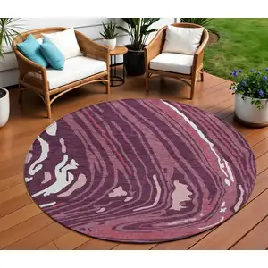 Photo of 8' Burgundy Brick Red And Ivory Round Abstract Washable Indoor Outdoor Area Rug