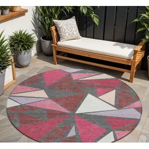 Photo of 8' Burgundy Pink And Charcoal Round Geometric Washable Indoor Outdoor Area Rug