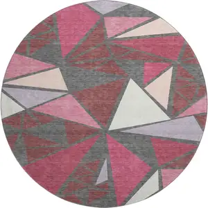 Photo of 8' Burgundy Pink And Ivory Geometric Washable Round Rug With UV Protection