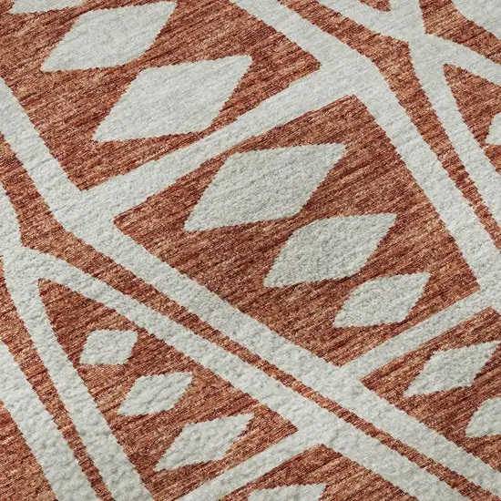 8' Burnt Sienna And Ivory Tribal Washable Round Rug With UV Protection Photo 9