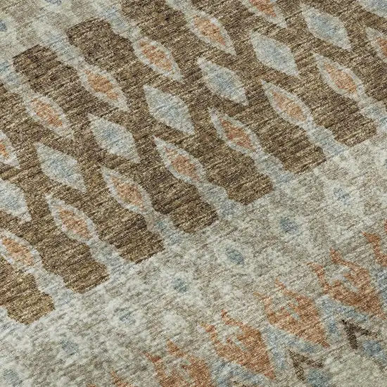 8' Burnt Sienna Ivory And Blue Tribal Washable Round Rug With UV Protection Photo 9