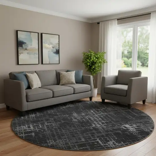 8' Charcoal And Ivory Abstract Geometric Washable Round Rug With UV Protection Photo 1