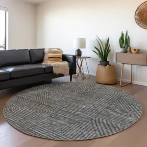 Photo of 8' Charcoal And Ivory Abstract Geometric Washable Round Rug With UV Protection
