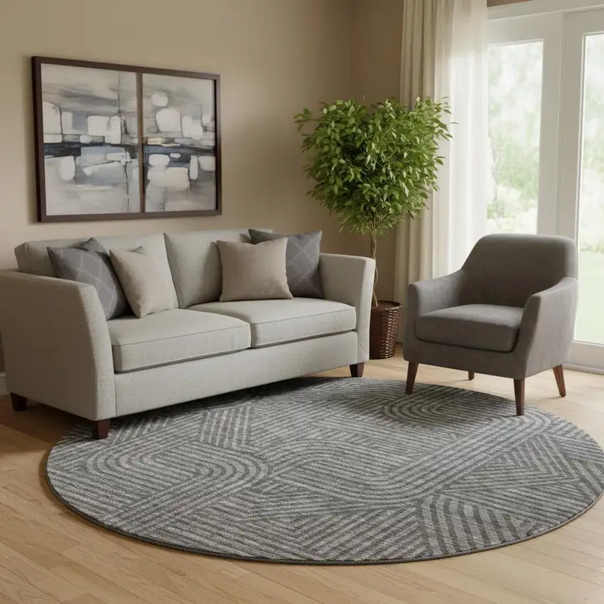 8' Charcoal And Ivory Abstract Geometric Washable Round Rug With UV Protection Photo 1