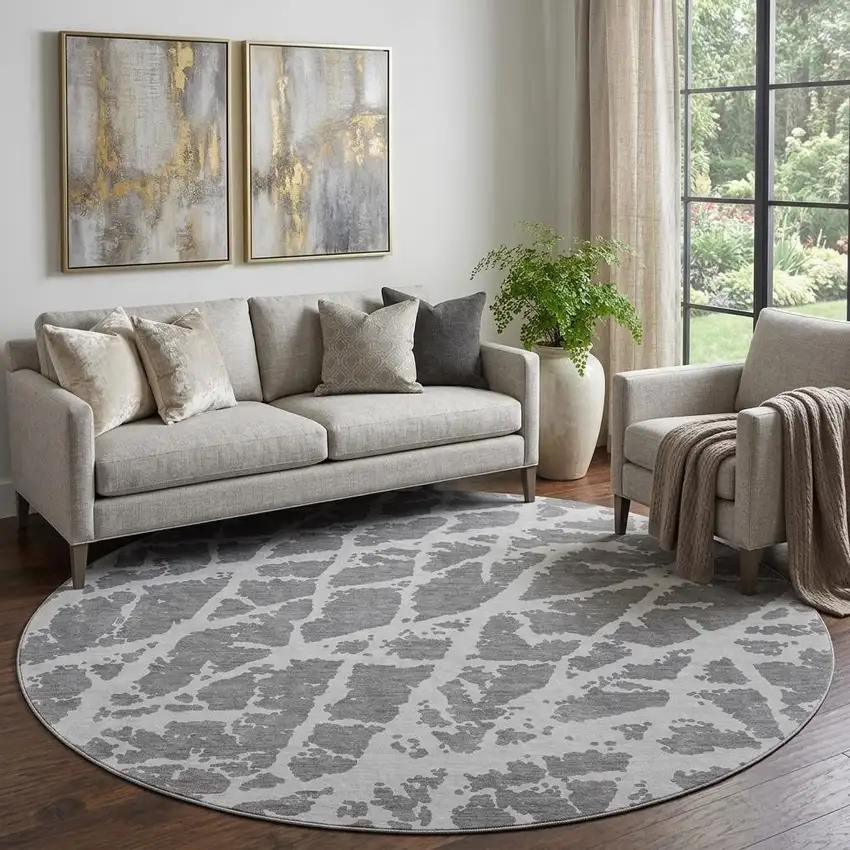 8' Charcoal And Ivory Abstract Washable Round Rug With UV Protection Photo 1