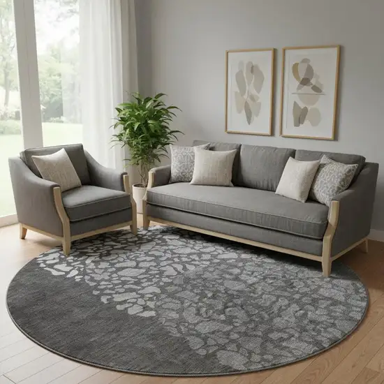 8' Charcoal And Ivory Abstract Washable Round Rug With UV Protection Photo 1