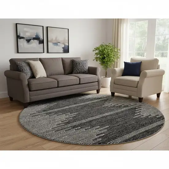 8' Charcoal And Ivory Abstract Washable Round Rug With UV Protection Photo 1