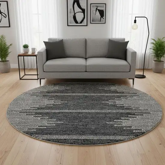 8' Charcoal And Ivory Abstract Washable Round Rug With UV Protection Photo 2