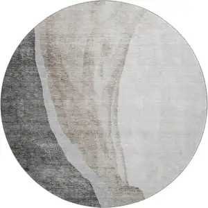 Photo of 8' Charcoal And Ivory Abstract Washable Round Rug With UV Protection