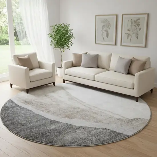 8' Charcoal And Ivory Abstract Washable Round Rug With UV Protection Photo 1