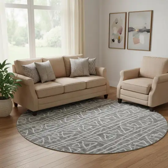 8' Charcoal And Ivory Geometric Washable Round Rug With UV Protection Photo 1