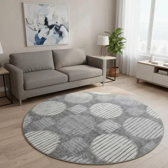 8' Charcoal And Ivory Geometric Washable Round Rug With UV Protection Photo 2