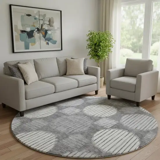 8' Charcoal And Ivory Geometric Washable Round Rug With UV Protection Photo 1