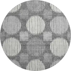 Photo of 8' Charcoal And Ivory Geometric Washable Round Rug With UV Protection