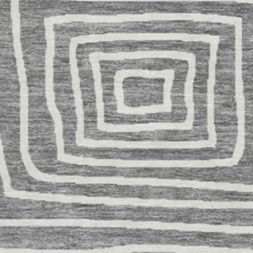 8' Charcoal And Ivory Geometric Washable Round Rug With UV Protection Photo 2