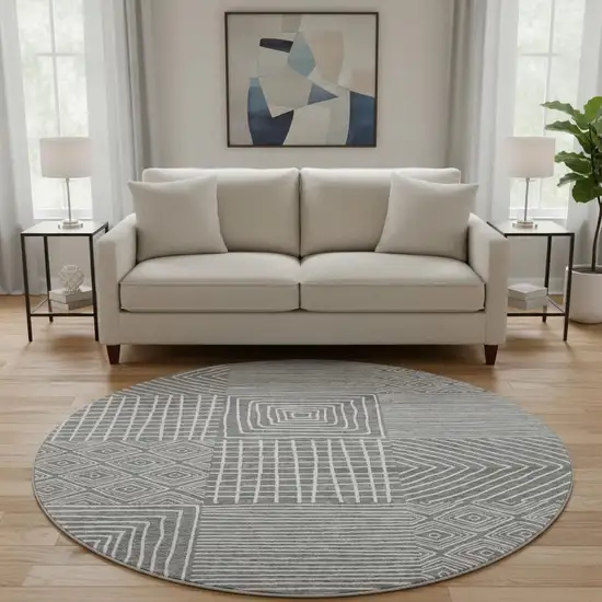 8' Charcoal And Ivory Geometric Washable Round Rug With UV Protection Photo 2