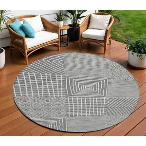 Photo of 8' Charcoal And Ivory Round Geometric Washable Indoor Outdoor Area Rug