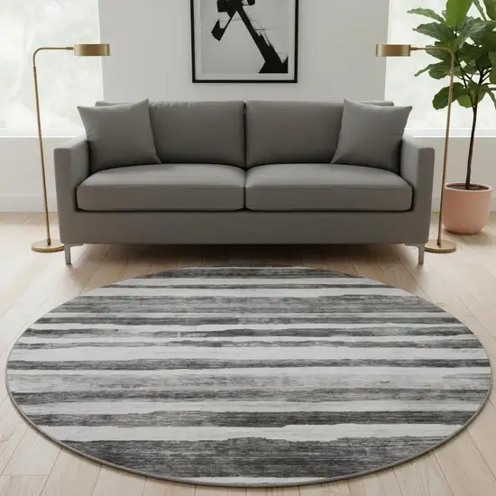8' Charcoal And Ivory Striped Washable Round Rug With UV Protection Photo 2