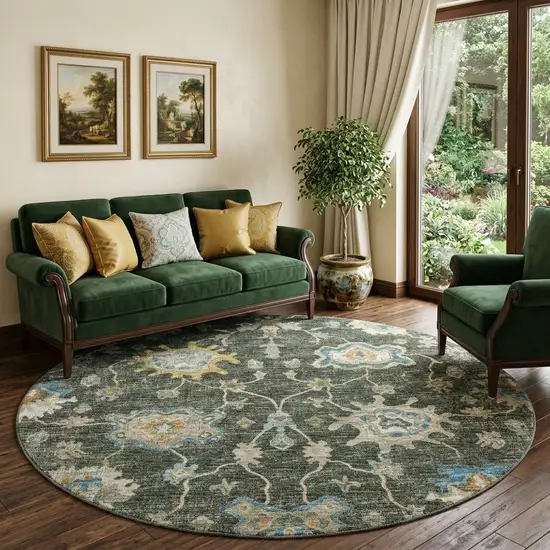 8' Charcoal Blue And Gold Floral Medallion Distressed Washable Round Rug With UV Protection Photo 1