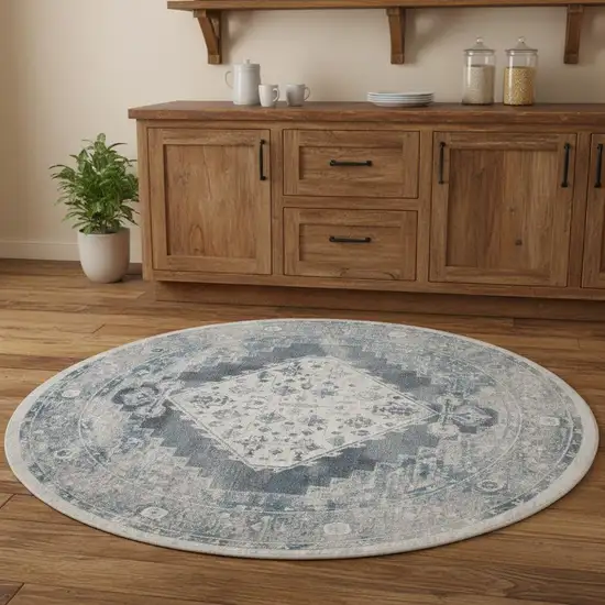 5' Charcoal Blue And Ivory Oriental Distressed Round Rug Photo 1