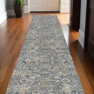 Photo of 12' Charcoal Brown And Ivory Floral Distressed Runner Rug With Fringe