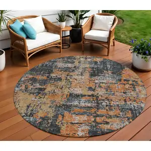 Photo of 8' Charcoal Copper And Ivory Round Abstract Washable Indoor Outdoor Area Rug