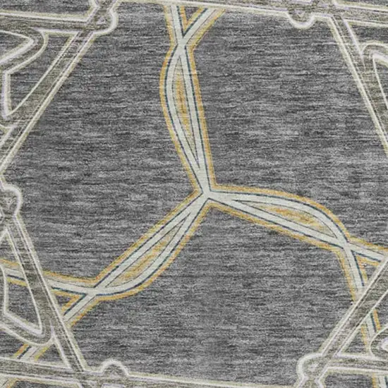 8' Charcoal Gold And Ivory Geometric Washable Round Rug With UV Protection Photo 3