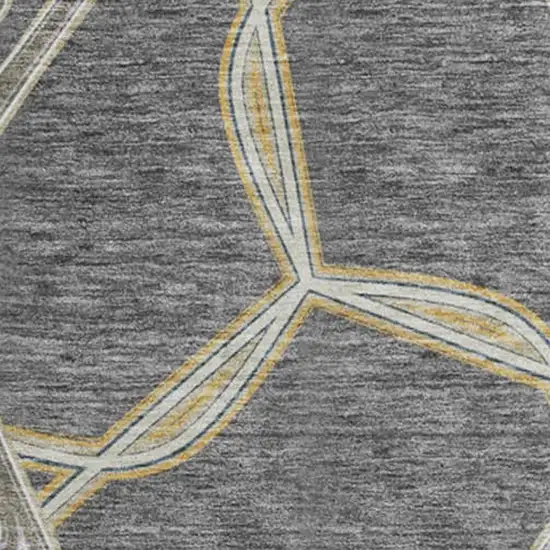 8' Charcoal Gold And Ivory Geometric Washable Round Rug With UV Protection Photo 2