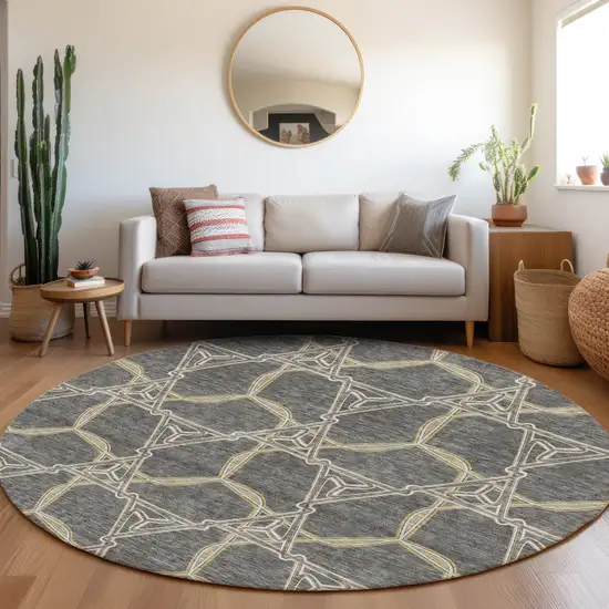8' Charcoal Gold And Ivory Geometric Washable Round Rug With UV Protection Photo 4