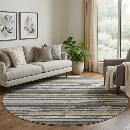 8' Charcoal Gray And Beige Striped Washable Round Rug With UV Protection Photo 1