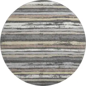 Photo of 8' Charcoal Gray And Beige Striped Washable Round Rug With UV Protection