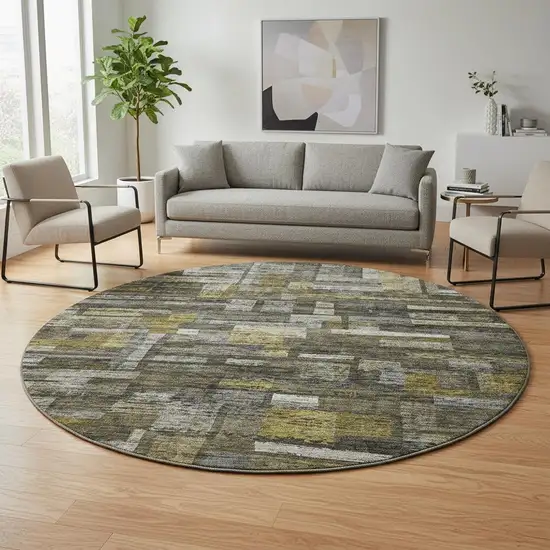 8' Charcoal Gray And Gold Striped Washable Round Rug With UV Protection Photo 2