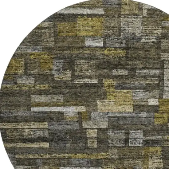 8' Charcoal Gray And Gold Striped Washable Round Rug With UV Protection Photo 2