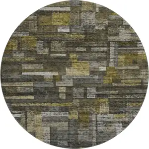 Photo of 8' Charcoal Gray And Gold Striped Washable Round Rug With UV Protection