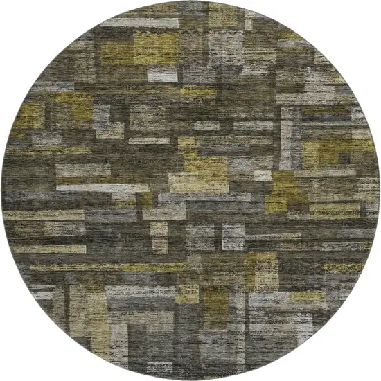 8' Charcoal Gray And Gold Striped Washable Round Rug With UV Protection Photo 1