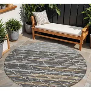 Photo of 8' Charcoal Gray And Ivory Round Striped Washable Indoor Outdoor Area Rug