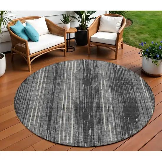 8' Charcoal Gray And Ivory Round Striped Washable Indoor Outdoor Area Rug Photo 1