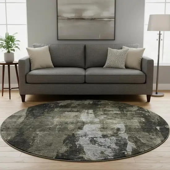 8' Charcoal Gray And Silver Abstract Washable Round Rug With UV Protection Photo 1
