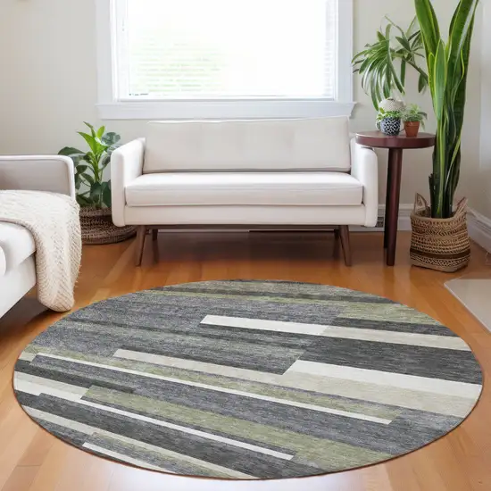 8' Charcoal Gray And Silver Striped Washable Round Rug With UV Protection Photo 5