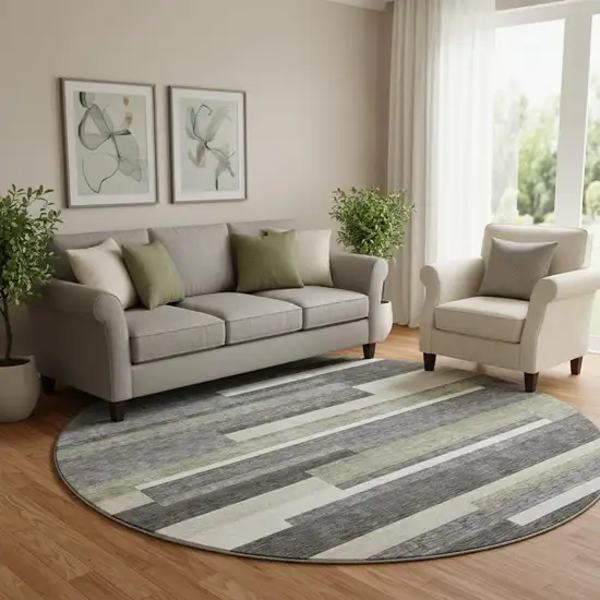 8' Charcoal Gray And Silver Striped Washable Round Rug With UV Protection Photo 1