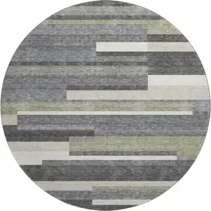 Photo of 8' Charcoal Gray And Silver Striped Washable Round Rug With UV Protection