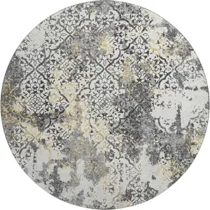 Photo of 8' Charcoal Ivory And Gold Abstract Washable Round Rug With UV Protection