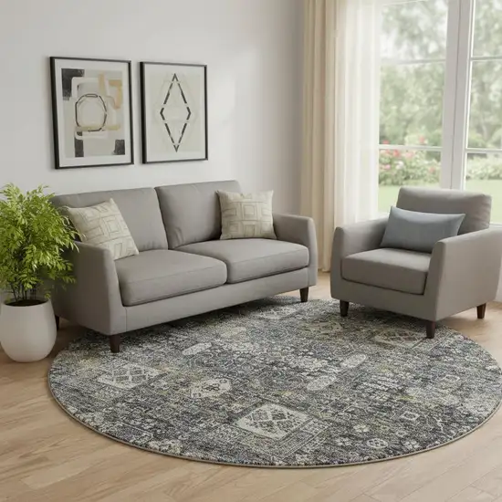 8' Charcoal Ivory And Gold Floral Washable Round Rug With UV Protection Photo 1