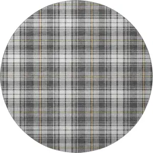Photo of 8' Charcoal Ivory And Gold Plaid Washable Round Rug With UV Protection