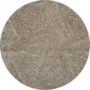 Photo of 8' Chocolate And Beige Abstract Washable Round Rug With UV Protection