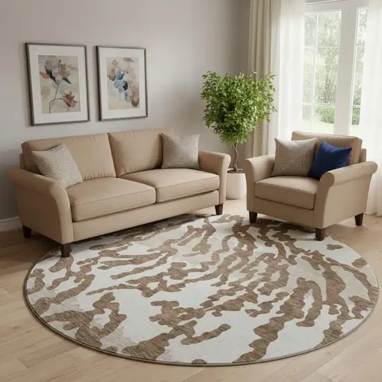 8' Chocolate And Beige Animal Print Washable Round Rug With UV Protection Photo 1